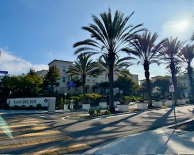 5502 Caminito Sandwaves Unit 173, San Diego, CA 92154 - view of asphalt street with traffic signs and sidewalks