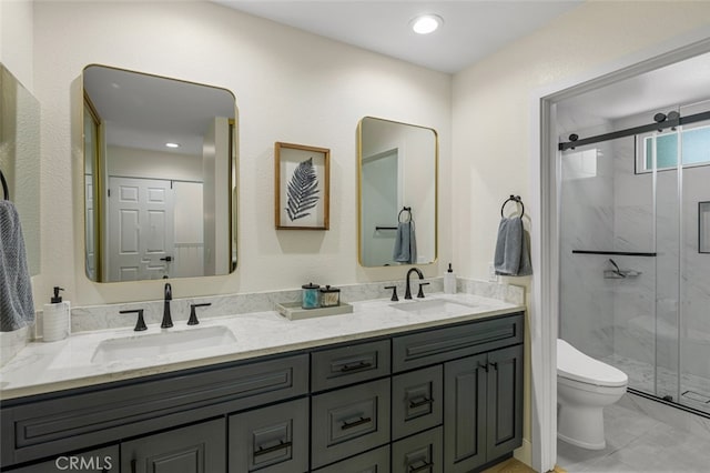 20 Marigold Unit 15, Irvine, CA 92614 - full bath with double vanity, a marble finish shower, and marble finish floors