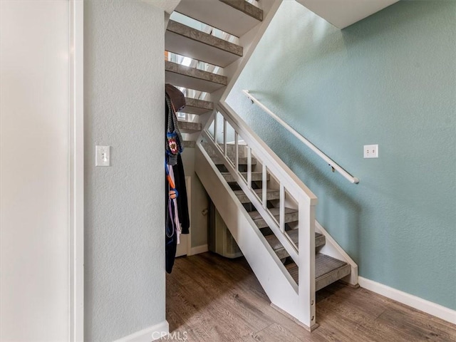 271 Vista Del Mar Unit 1, San Simeon, CA 93452 - stairs featuring a textured wall and wood finished floors