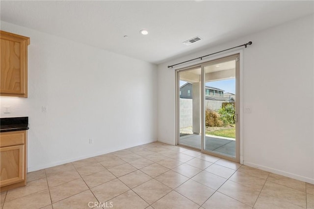 843 Sydney Way, Lemoore, CA 93245 - spare room with light tile patterned floors and recessed lighting