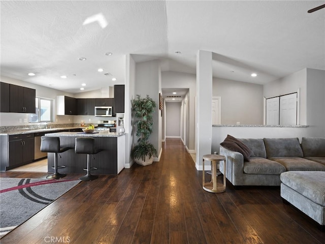 7755 7th St, Phelan, CA 92371 - living area with vaulted ceiling, hardwood / wood-style floors, and recessed lighting