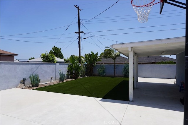 13906 S Kalsman Ave, Compton, CA 90222 - fenced backyard featuring a patio