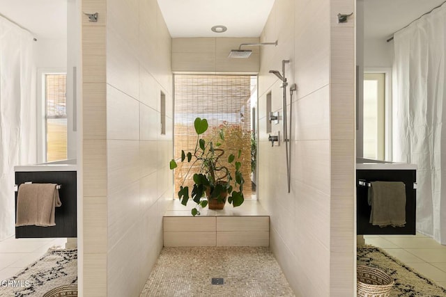 54667 Benecia Trl, Yucca Valley, CA 92284 - bathroom featuring a tile shower and tile walls