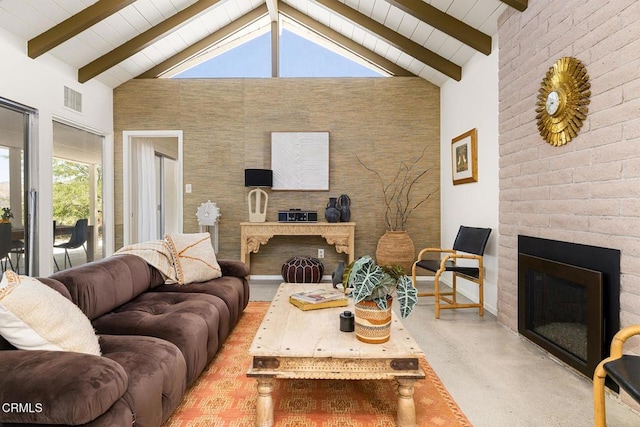 54667 Benecia Trl, Yucca Valley, CA 92284 - living room with a fireplace, beam ceiling, high vaulted ceiling, and finished concrete floors