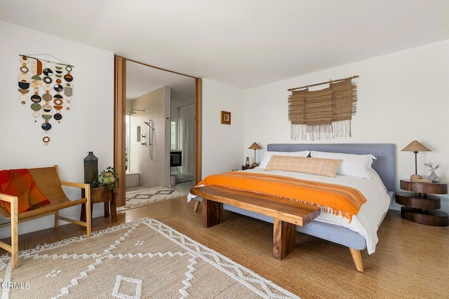 54667 Benecia Trl, Yucca Valley, CA 92284 - bedroom with wood finished floors and connected bathroom