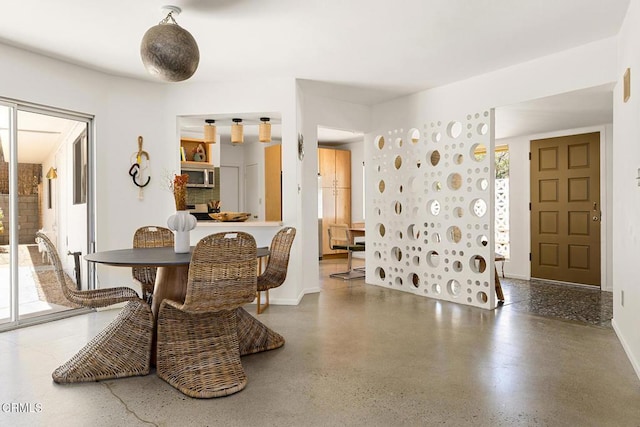 54667 Benecia Trl, Yucca Valley, CA 92284 - dining area featuring plenty of natural light and speckle patterned floor