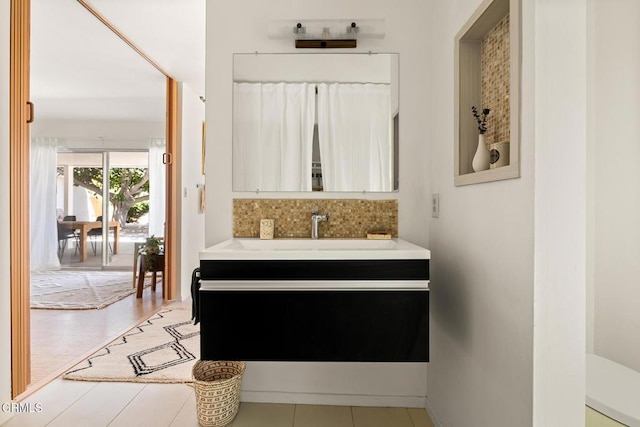 54667 Benecia Trl, Yucca Valley, CA 92284 - bathroom with tasteful backsplash and vanity