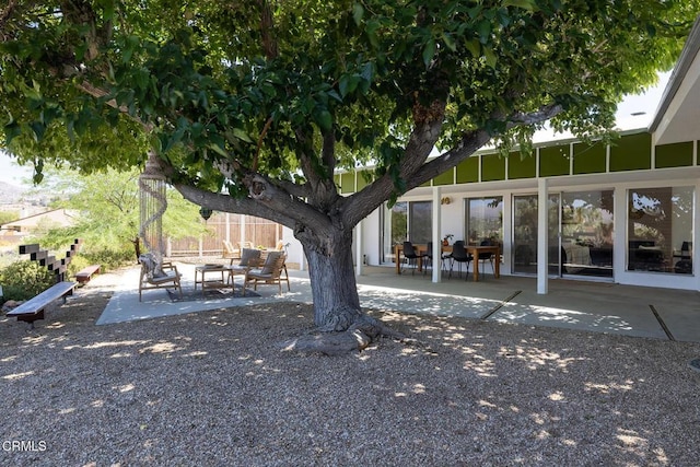 54667 Benecia Trl, Yucca Valley, CA 92284 - view of yard featuring a patio