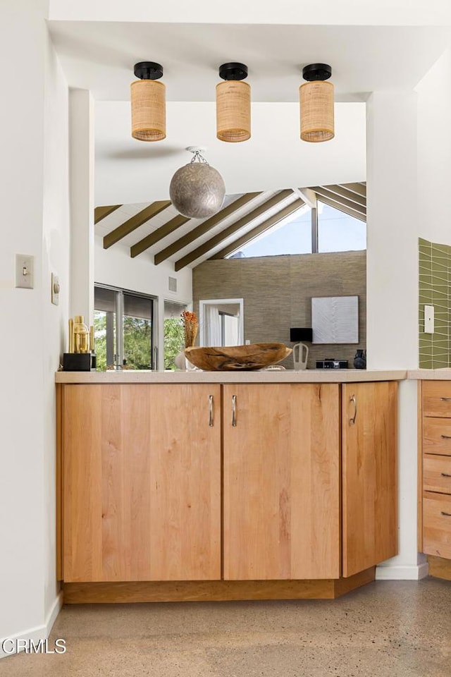 54667 Benecia Trl, Yucca Valley, CA 92284 - kitchen with light brown cabinets and dark aggregate flooring