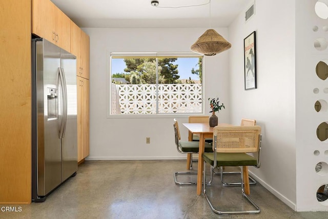 54667 Benecia Trl, Yucca Valley, CA 92284 - dining space featuring concrete floors and baseboards