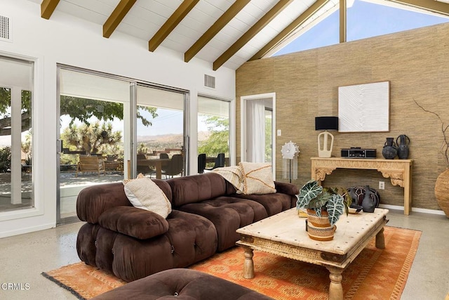 54667 Benecia Trl, Yucca Valley, CA 92284 - living room featuring beamed ceiling, high vaulted ceiling, and healthy amount of natural light