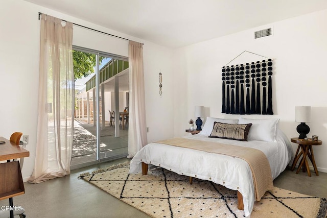 54667 Benecia Trl, Yucca Valley, CA 92284 - bedroom with access to outside and finished concrete flooring