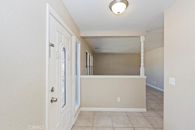 7267 Dalscote St, Hesperia, CA 92345 - entryway with tile patterned flooring and baseboards