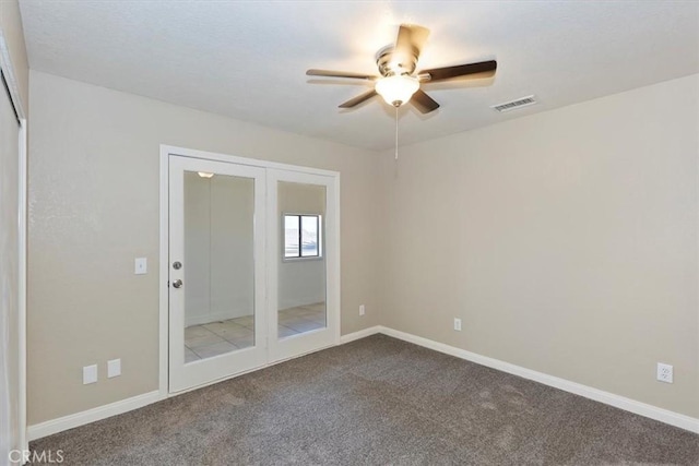 7267 Dalscote St, Hesperia, CA 92345 - empty room featuring a ceiling fan and dark carpet
