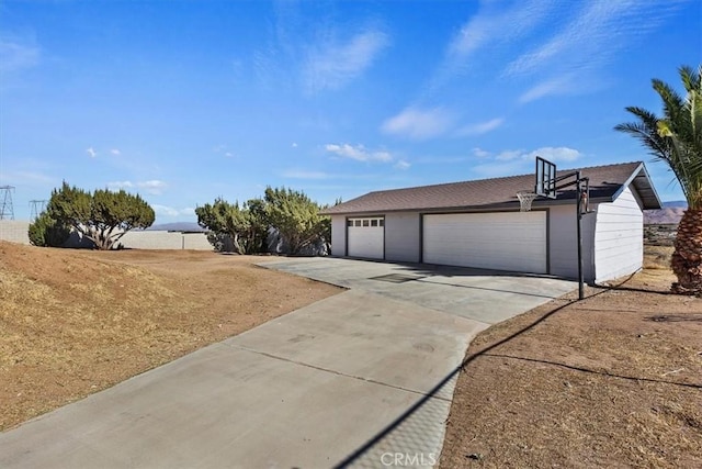 7267 Dalscote St, Hesperia, CA 92345 - view of front of house featuring a detached garage and driveway