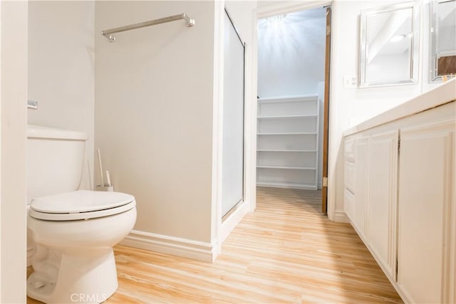 966 Willow Creek Rd Unit 14, Lake Arrowhead, CA 92352 - bathroom with wood finished floors, a stall shower, and a closet