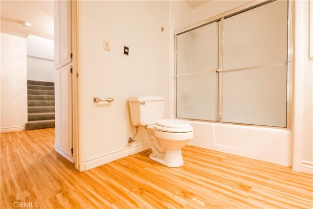 966 Willow Creek Rd Unit 14, Lake Arrowhead, CA 92352 - bathroom featuring wood finished floors and combined bath / shower with glass door
