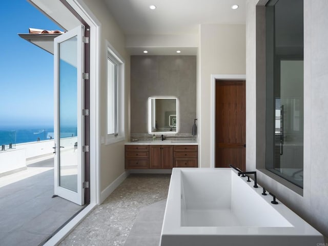 211 Mar De Cortez, Avalon, CA 90704 - bathroom featuring a freestanding bath, vanity, and recessed lighting