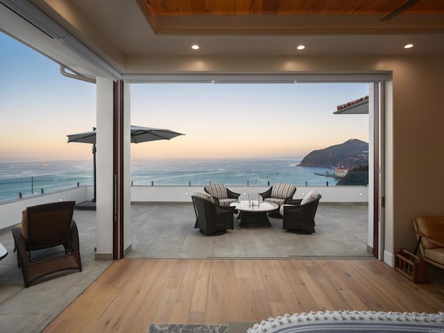 211 Mar De Cortez, Avalon, CA 90704 - interior space featuring hardwood / wood-style flooring, a water view, and recessed lighting