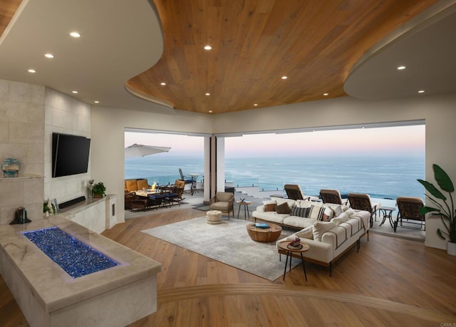 211 Mar De Cortez, Avalon, CA 90704 - living room featuring recessed lighting, wood ceiling, wood finished floors, and a tiled fireplace