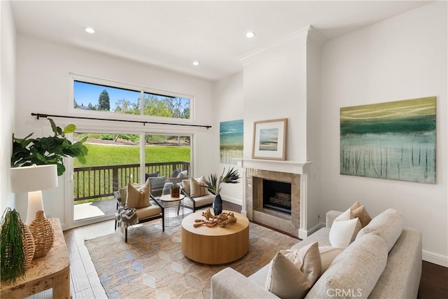51 Sea Pine Ln, Newport Beach, CA 92660 - living room featuring recessed lighting, a fireplace, a high ceiling, and wood finished floors