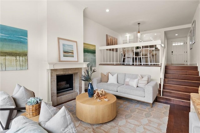 51 Sea Pine Ln, Newport Beach, CA 92660 - living room with hardwood / wood-style floors, stairs, recessed lighting, and a tiled fireplace