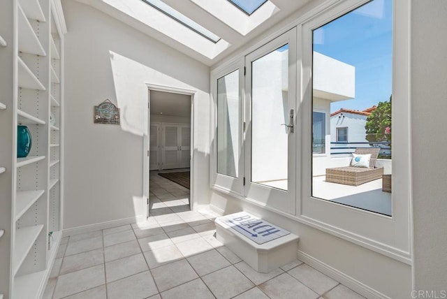 3366 Bayside Walk, San Diego, CA 92109 - unfurnished sunroom with a skylight, french doors, and tile patterned floors