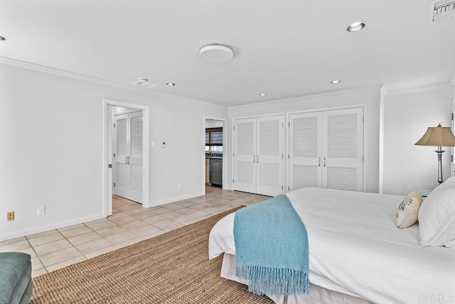 3366 Bayside Walk, San Diego, CA 92109 - tiled bedroom featuring crown molding, two closets, and recessed lighting