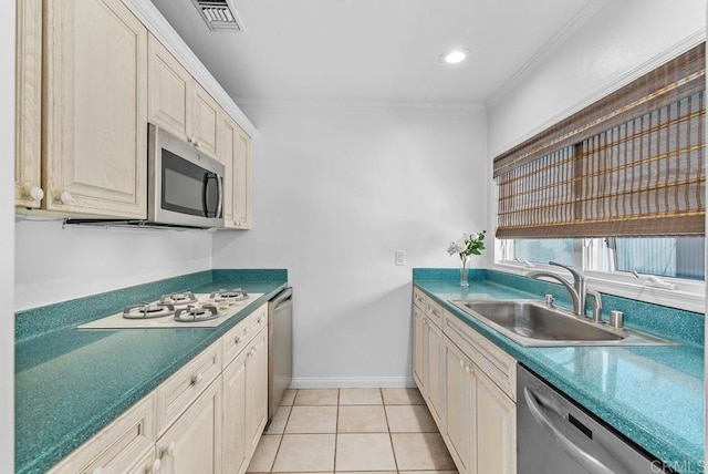 3366 Bayside Walk, San Diego, CA 92109 - kitchen with appliances with stainless steel finishes, crown molding, light tile patterned floors, and recessed lighting