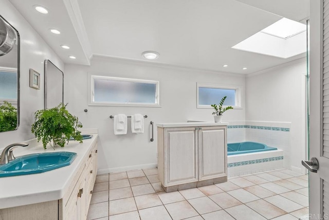 3366 Bayside Walk, San Diego, CA 92109 - full bath featuring ornamental molding, a skylight, double vanity, a garden tub, and tile patterned flooring
