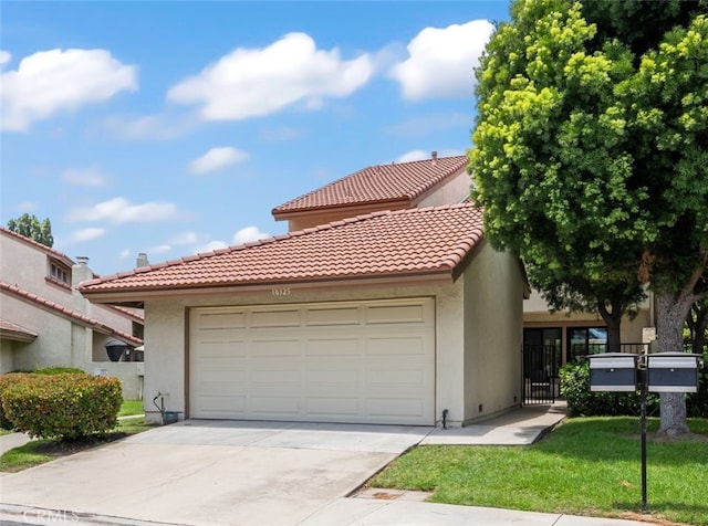 18325 Gum Tree Ln, Huntington Beach, CA 92646 - view of front of property featuring a garage, stucco siding, driveway, and a tiled roof