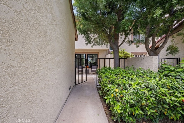 18325 Gum Tree Ln, Huntington Beach, CA 92646 - view of exterior entry featuring stucco siding