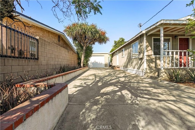 936 Gonzales St, Placentia, CA 92870 - view of side of home with an outdoor structure and a garage