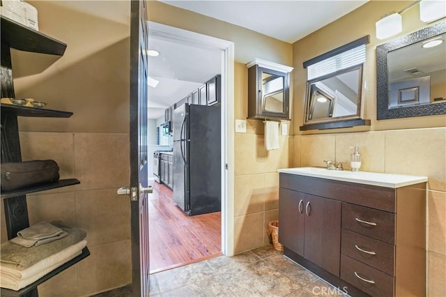 936 Gonzales St, Placentia, CA 92870 - bathroom with tile walls and vanity
