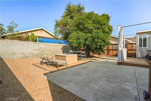 936 Gonzales St, Placentia, CA 92870 - fenced backyard with a patio and a fire pit