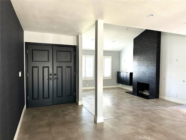 1063 Redding Ave, Costa Mesa, CA 92626 - foyer entrance featuring a textured ceiling and tile patterned floors