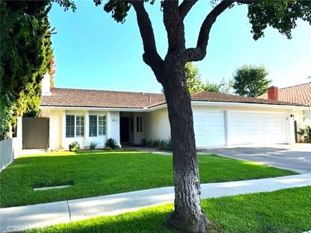 1063 Redding Ave, Costa Mesa, CA 92626 - ranch-style house featuring an attached garage, a chimney, concrete driveway, and stucco siding