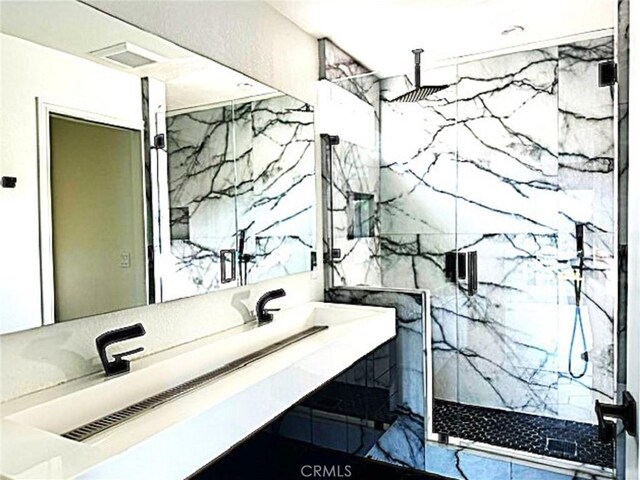 1063 Redding Ave, Costa Mesa, CA 92626 - bathroom with a marble finish shower and vanity