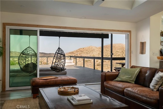 59855 Security Dr, Yucca Valley, CA 92284 - living room with a mountain view, healthy amount of natural light, and wood finished floors