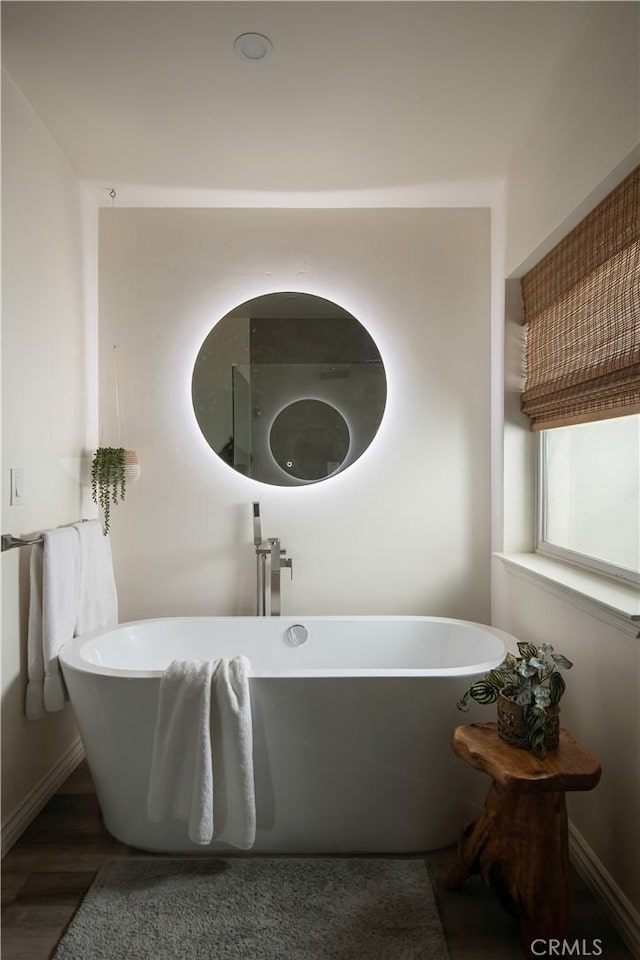 59855 Security Dr, Yucca Valley, CA 92284 - full bathroom with a freestanding tub and wood finished floors