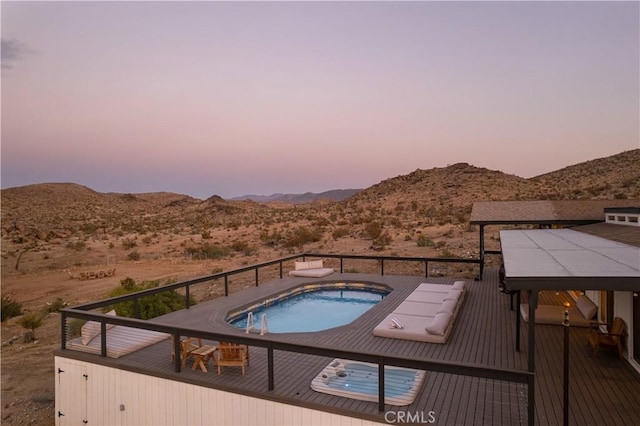 59855 Security Dr, Yucca Valley, CA 92284 - pool at dusk with a deck with mountain view and a desert view