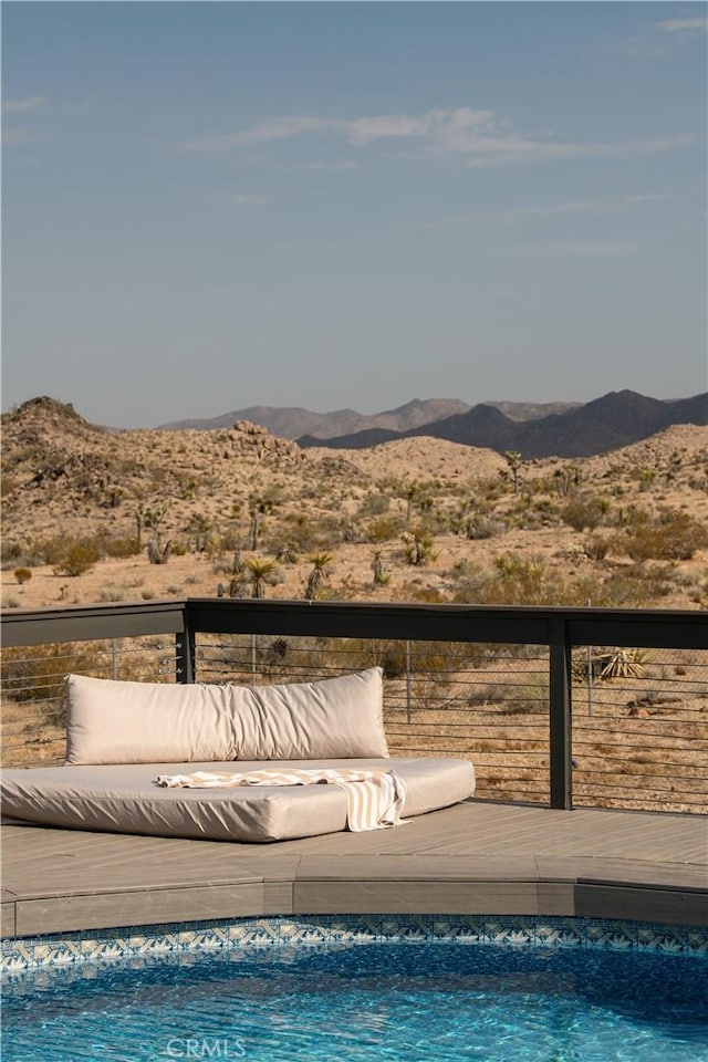 59855 Security Dr, Yucca Valley, CA 92284 - swimming pool with outdoor lounge area and a mountain view