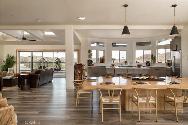 59855 Security Dr, Yucca Valley, CA 92284 - dining area with plenty of natural light, dark wood-style flooring, recessed lighting, a ceiling fan, and beam ceiling