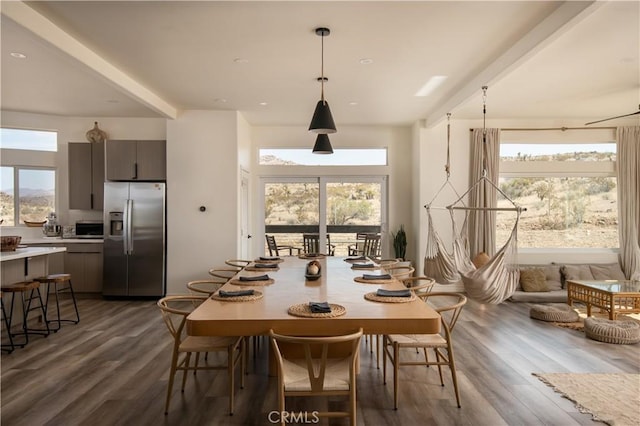 59855 Security Dr, Yucca Valley, CA 92284 - dining space featuring healthy amount of natural light and dark wood-style flooring