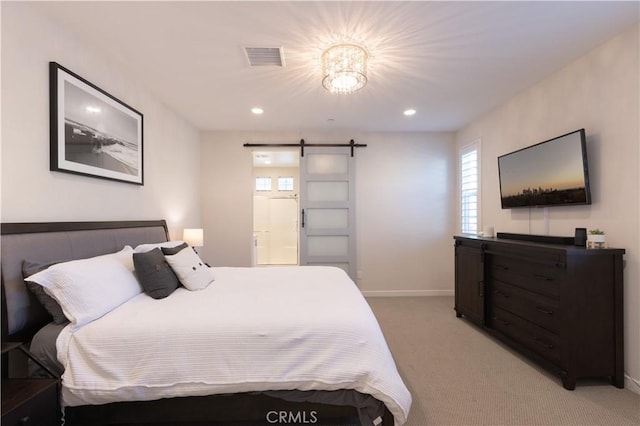 45055 Via Vela, Temecula, CA 92592 - bedroom featuring a barn door, light colored carpet, recessed lighting, and connected bathroom
