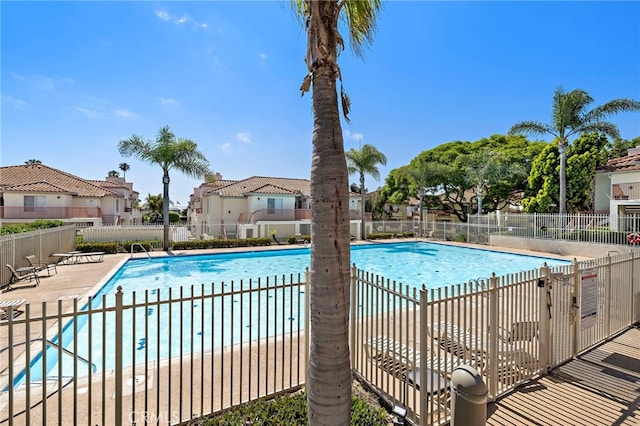 405 Ribbon Beach Way Unit 243, Oceanside, CA 92058 - community pool featuring a patio and a residential view