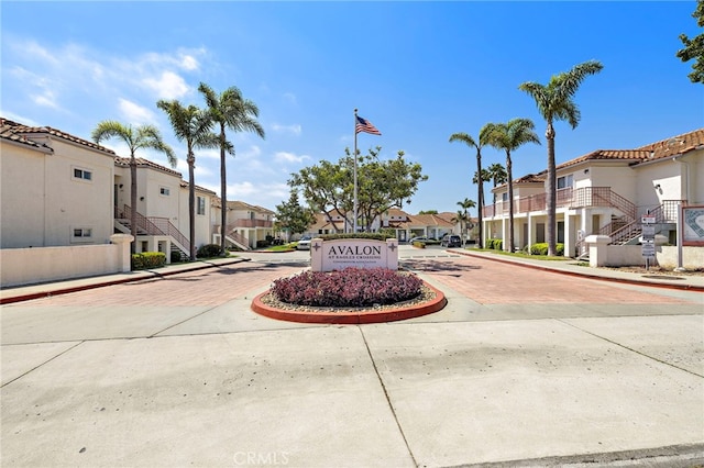 405 Ribbon Beach Way Unit 243, Oceanside, CA 92058 - view of concrete street with a residential view, curbs, and stairs