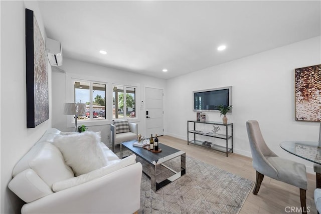 16082 Athol St, Fontana, CA 92335 - living room with a wall mounted air conditioner, wood finished floors, and recessed lighting