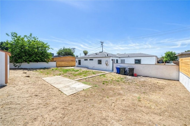 16082 Athol St, Fontana, CA 92335 - back of house featuring a fenced backyard