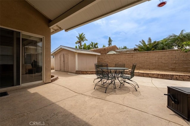 2631 Harvest Crest Ln, Corona, CA 92881 - view of patio with a shed and outdoor dining area